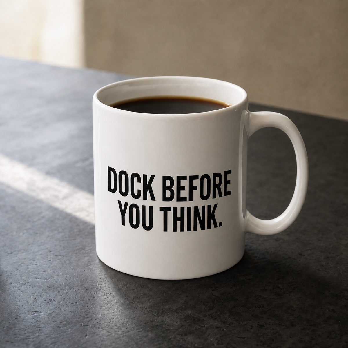 White 11 oz Flowkeeper Mug printed with 'Dock Before You Think.'